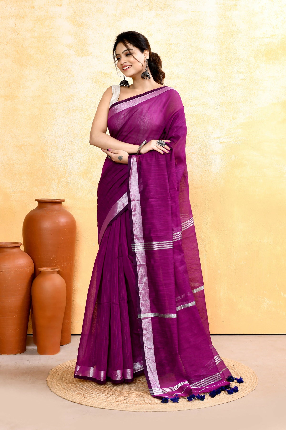 Magenta Cotton Blend Handloom Saree with Embellished Zari Border