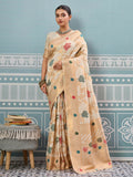 Elegant cream silk saree with matching silk blouse, draped in a traditional style