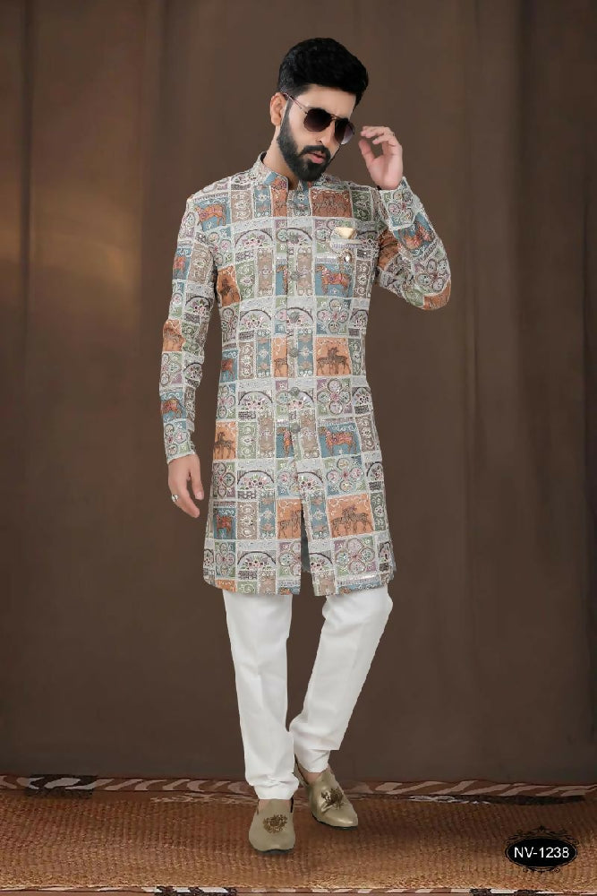 Boys blue georgette kurta with intricate thread and sequence embroidery paired with a pyjama.