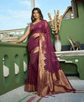 Deep Wine Organza Silk saree with weaving work and elegant tassel finish