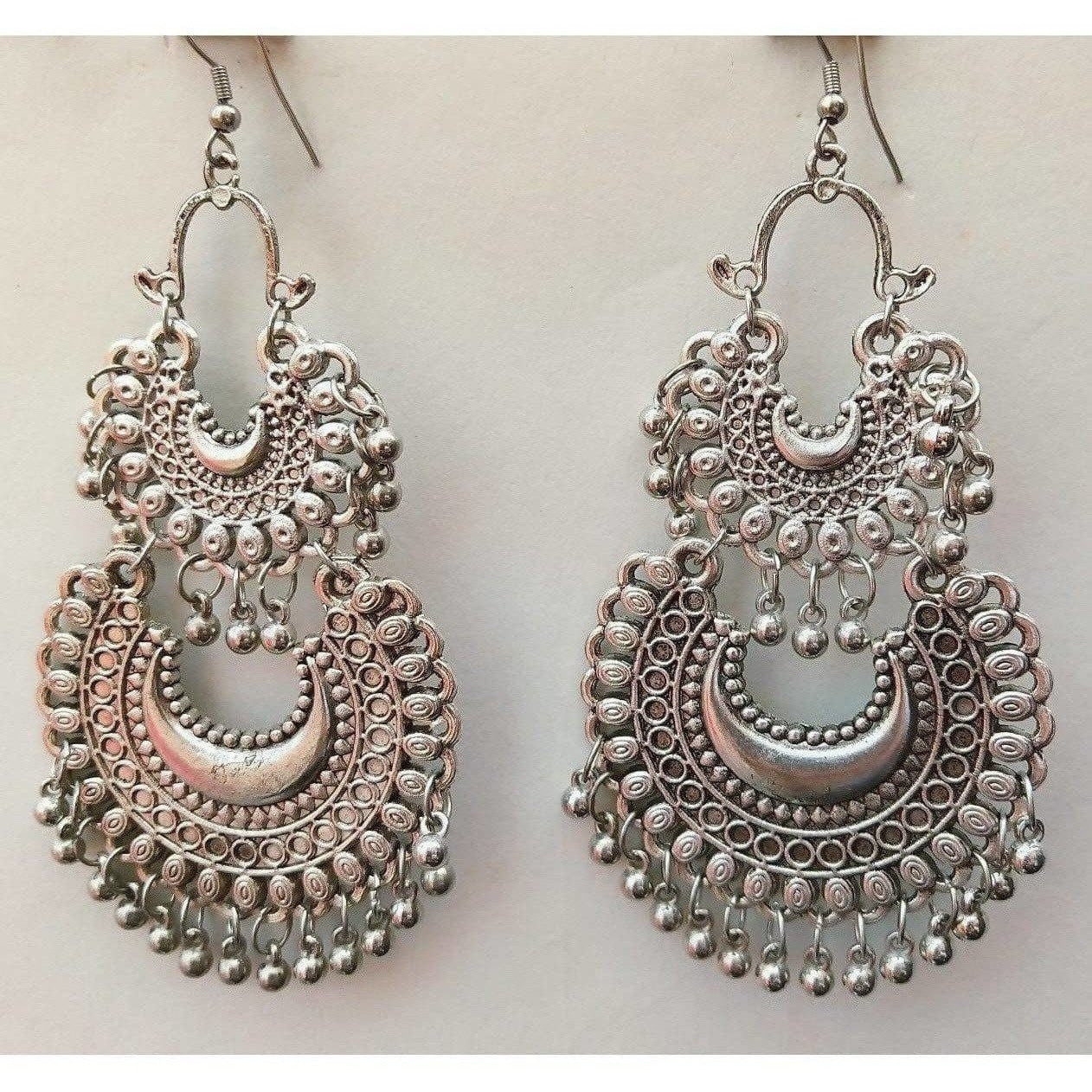 Fancy silver oxidized earrings with tassel drop detail