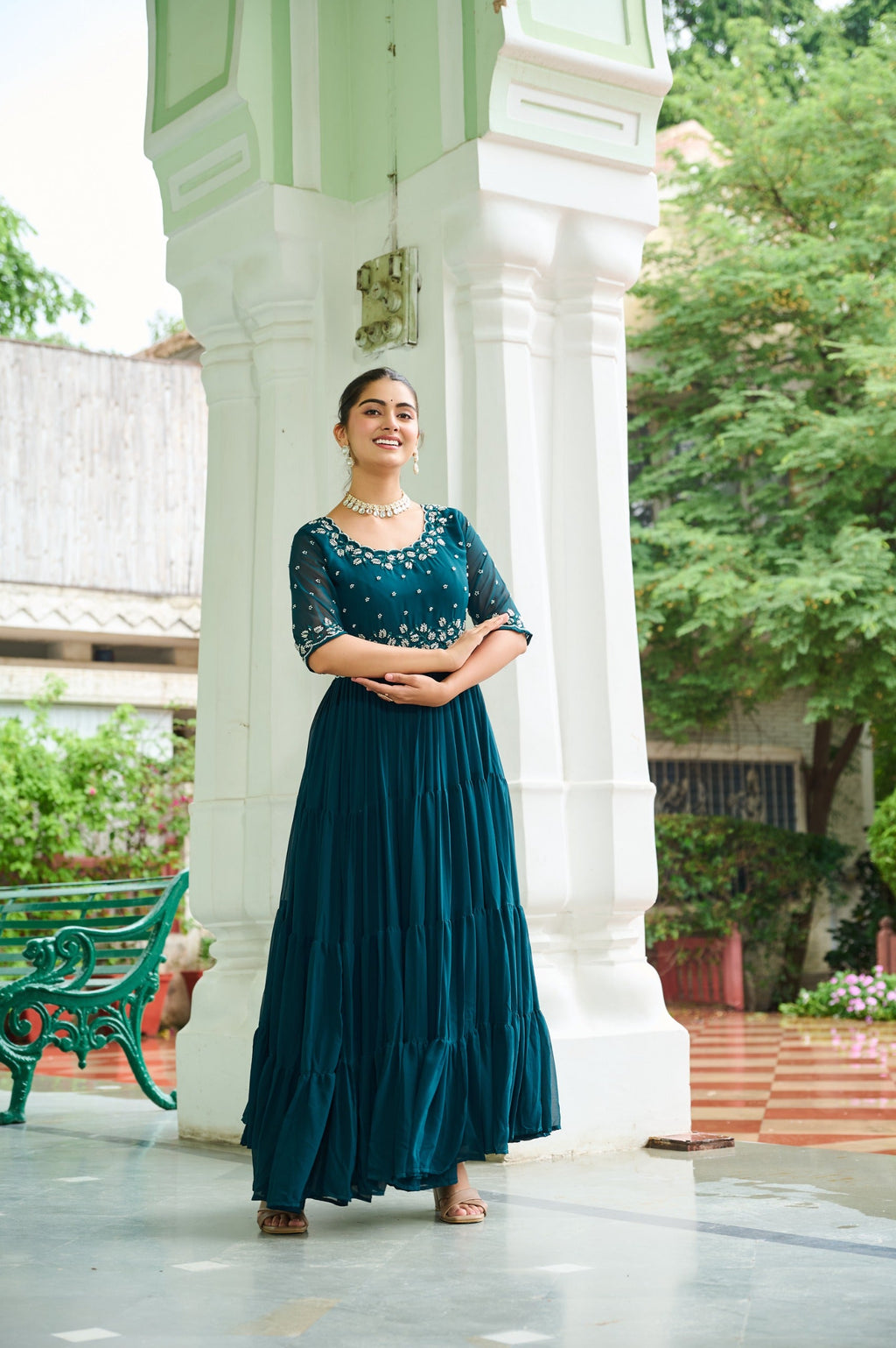 Rama teal georgette gown featuring intricate silver beads embroidery and a wide 12-meter flair.