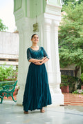 Rama teal georgette gown featuring intricate silver beads embroidery and a wide 12-meter flair.