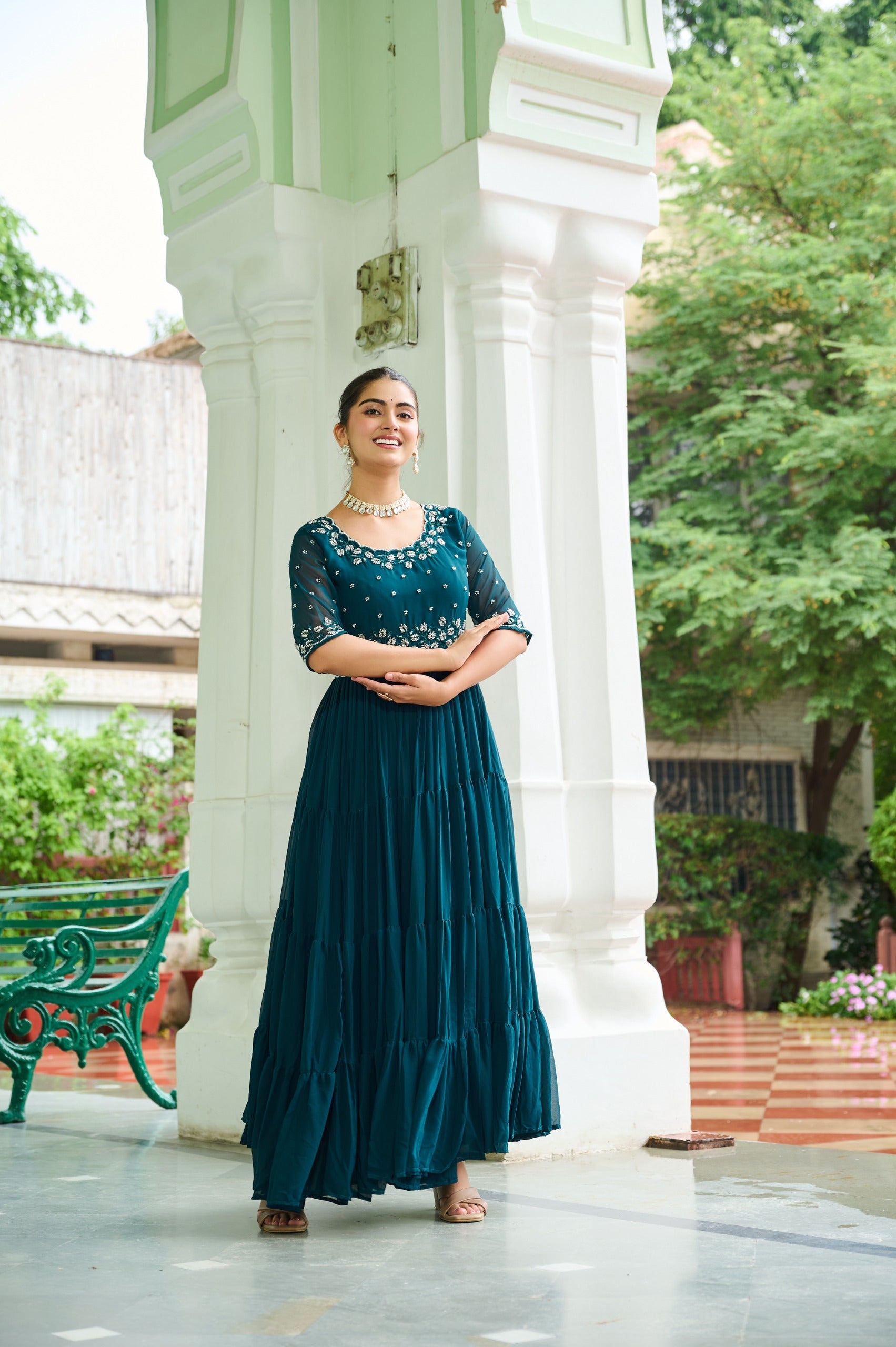 Rama teal georgette gown featuring intricate silver beads embroidery and a wide 12-meter flair.