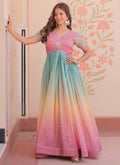 Model wearing a multi-color georgette embroidered gown with intricate beadwork and flowy chiffon fabric.