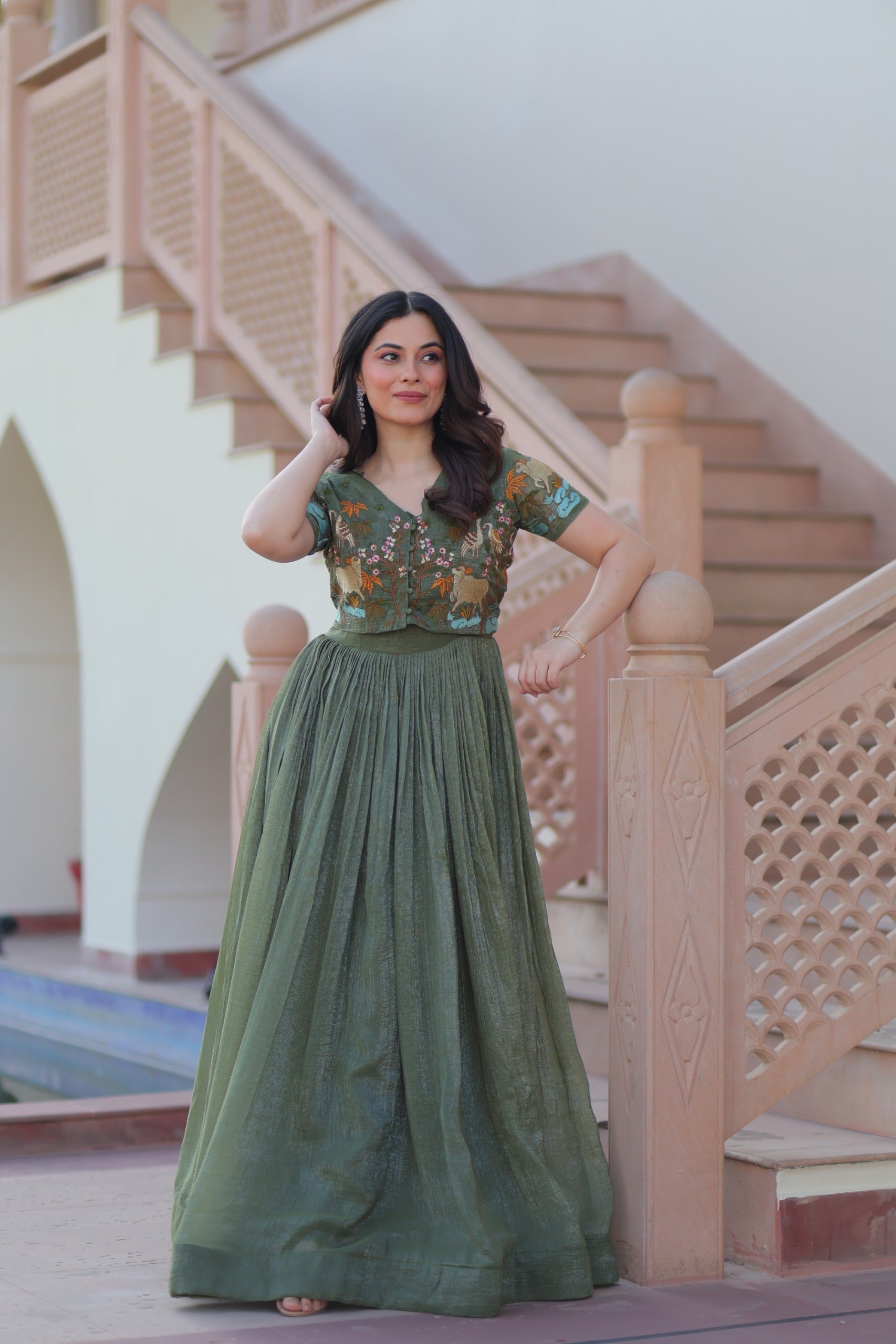 Mahendi and silver colored crunchy fabric gown with matching embroidered Koti