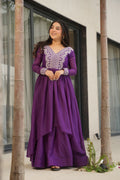 A beautiful purple georgette designer gown with detailed bead and sequin embroidery.