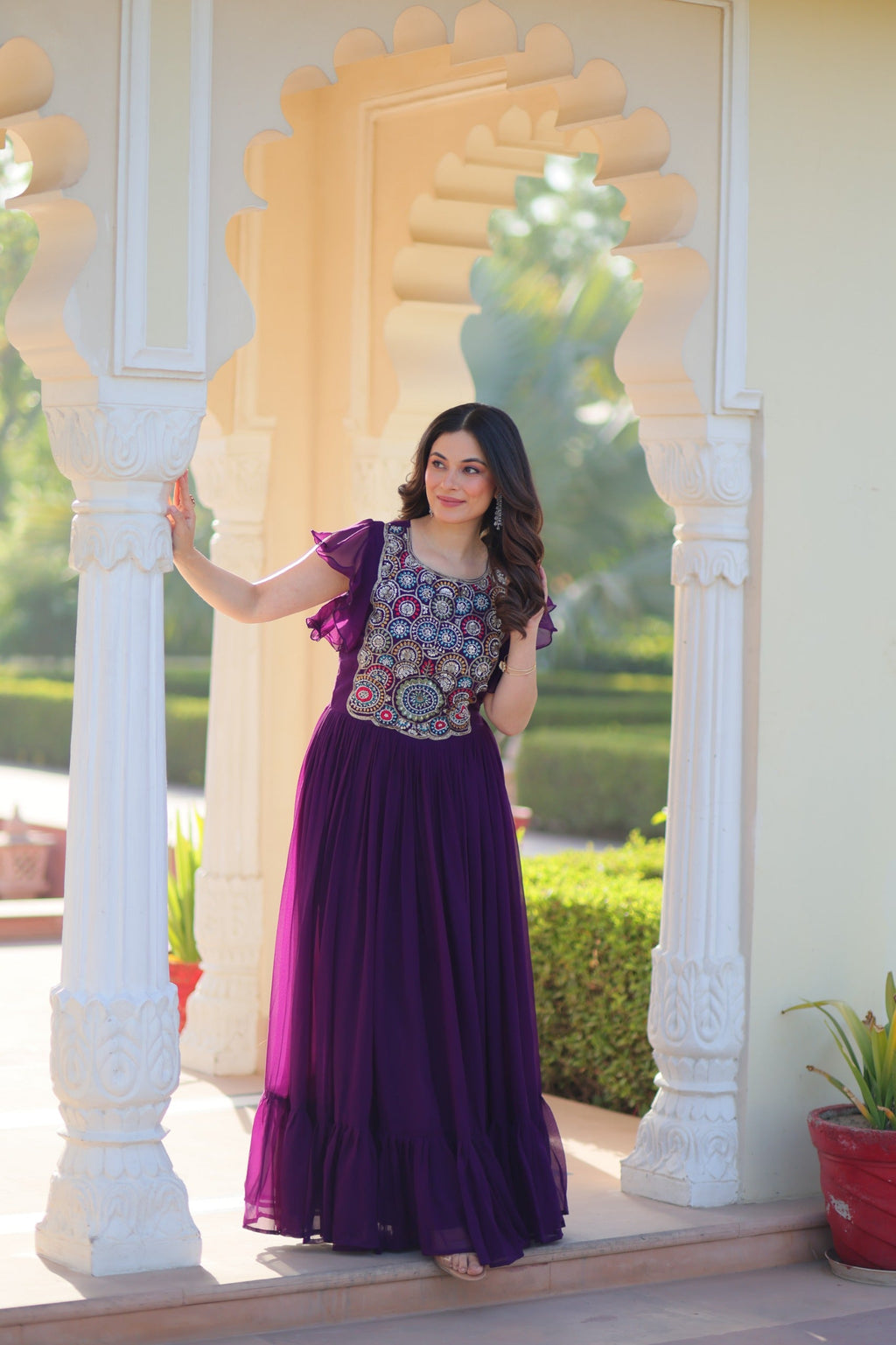 Purple Georgette gown featuring detailed bead and sequin embroidery