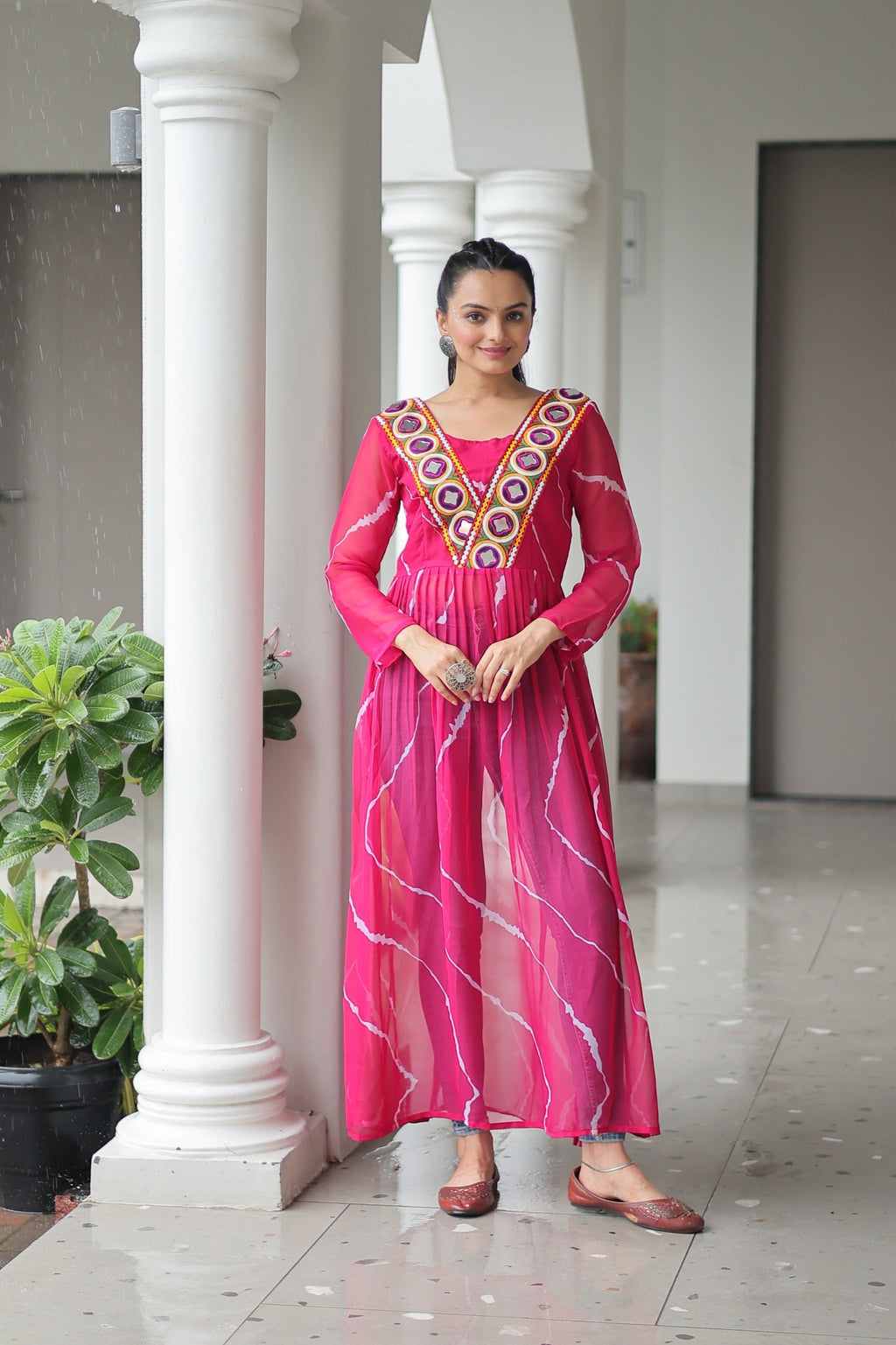 Pink faux georgette Navratri gown with Leheriya print and Kutchi patchwork details