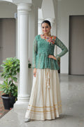 Green Bandhani print Navaratri lehenga with colorful Kutchi Gamthi patchwork and gold Gota-Patti details.