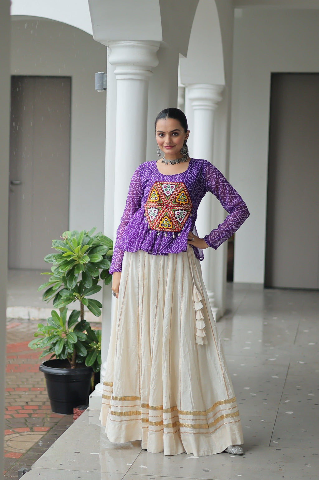 Violet georgette bandhani print lehenga with Kutchi Gamthi patchwork and Gota-Patti lace.