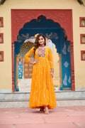 Yellow Georgette gown with vibrant Laheriya print and detailed Kutchi patchwork for festive wear