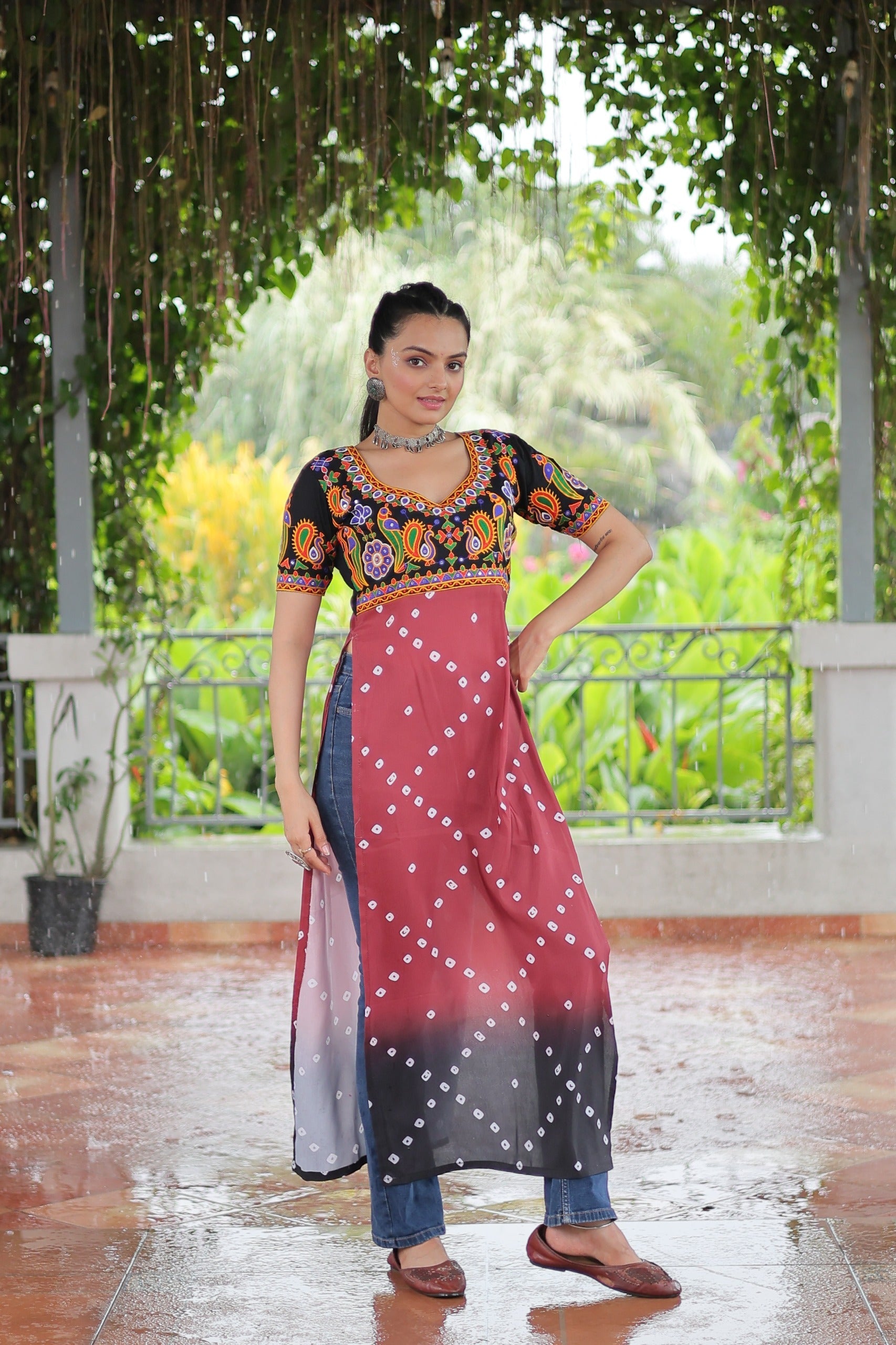 Pink Rayon printed Kurti with Kutchi Gamthi embroidery details