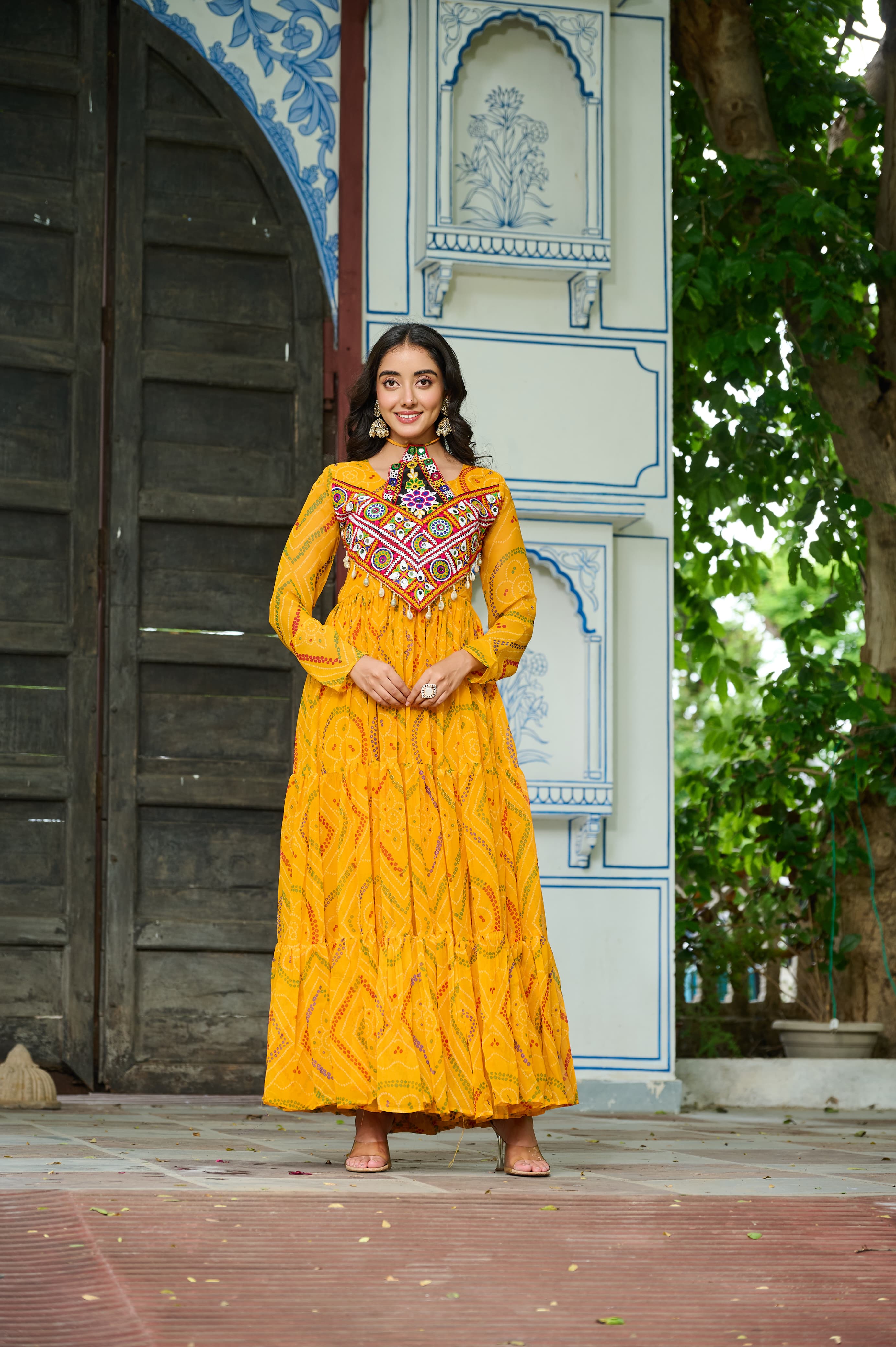 Yellow georgette kurti with traditional Bandhani print and ethnic Kutchi patchwork details