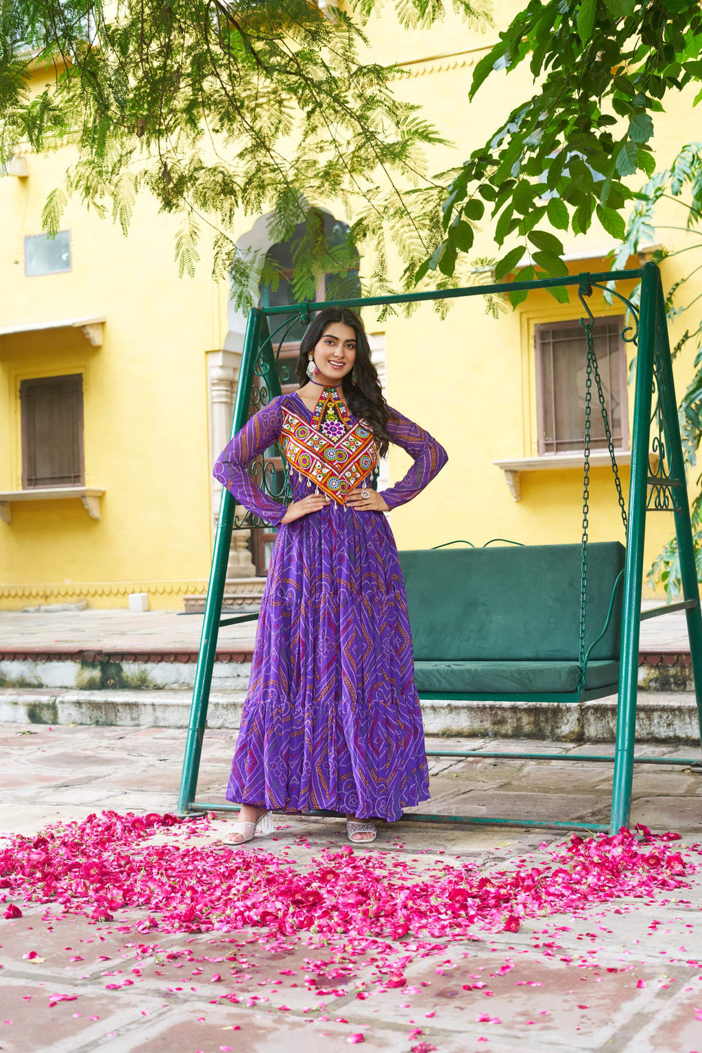 Purple faux georgette gown with Bandhani print and colorful Kutchi patchwork for Navratri