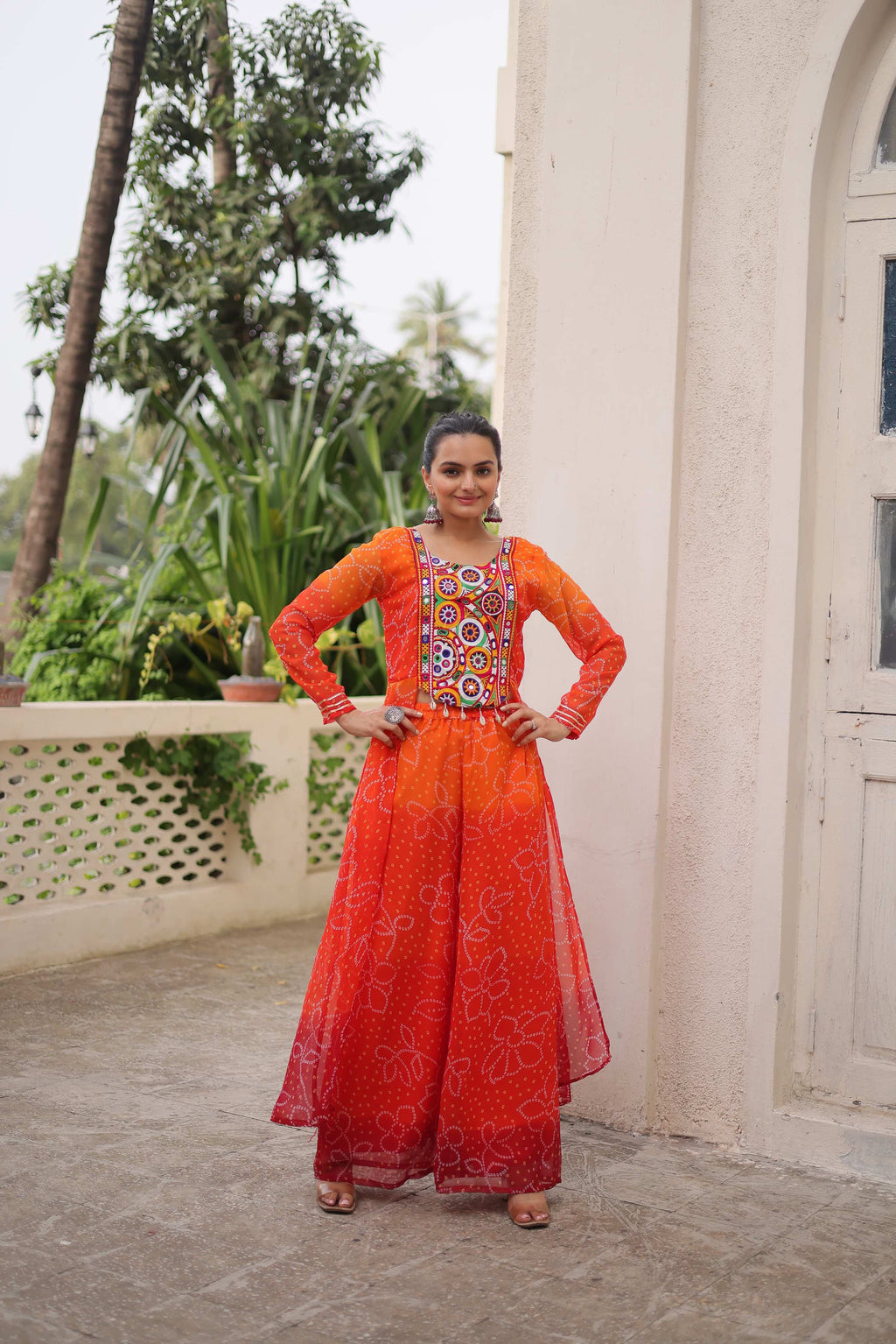 Orange Georgette Bandhani Print Suit with Gamthi Patchwork