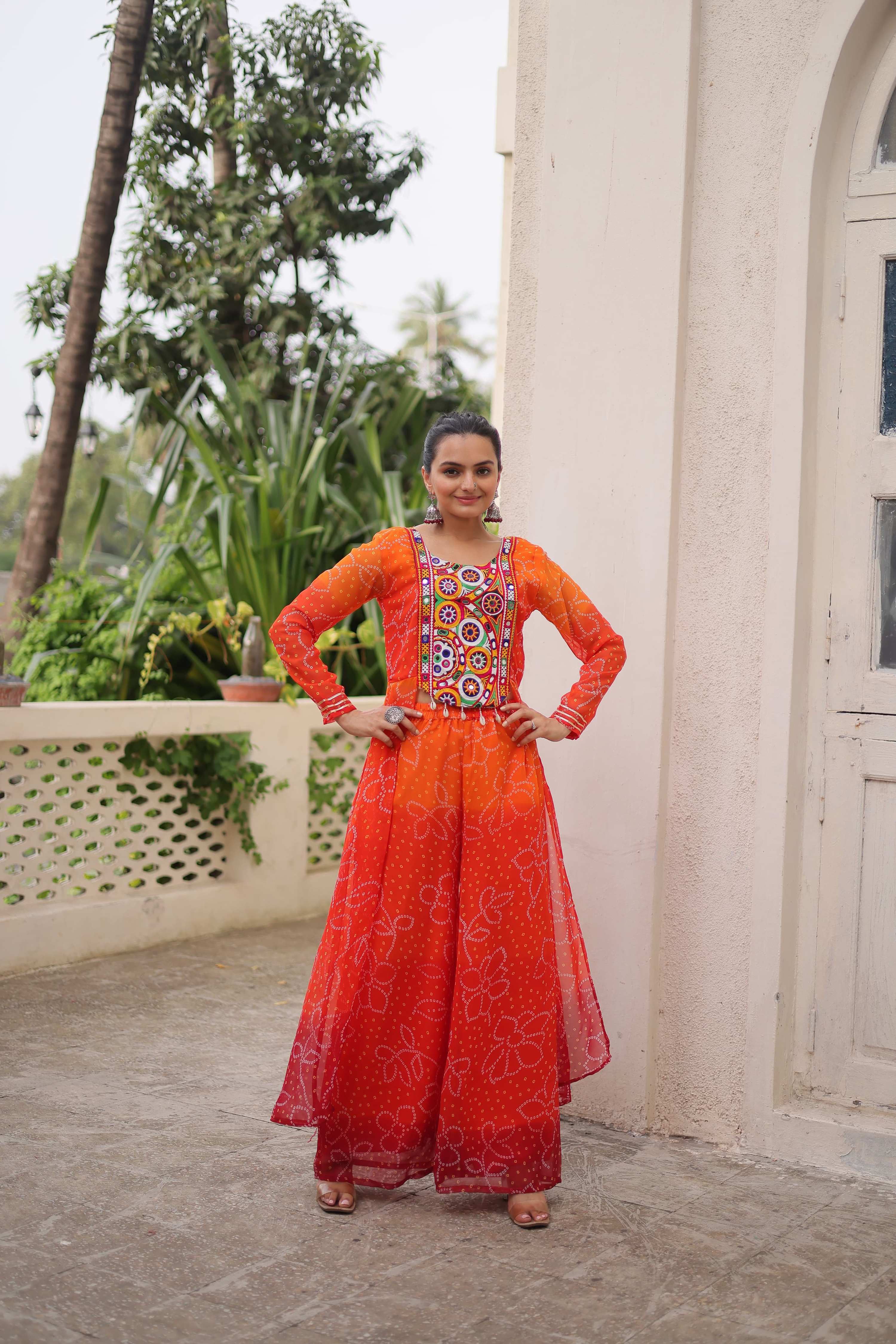 Orange Georgette Bandhani Print Suit with Gamthi Patchwork