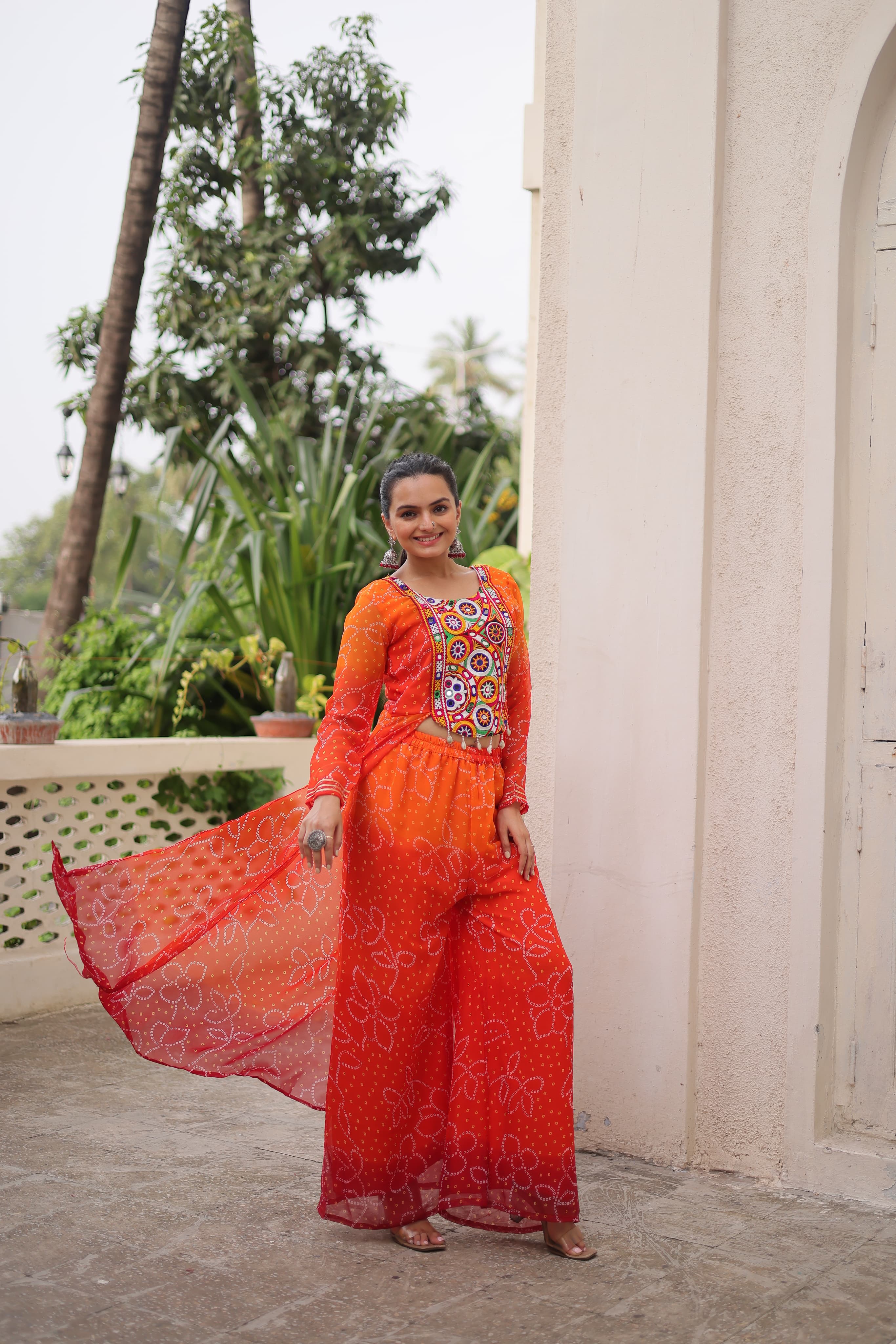 Orange Georgette Bandhani Print Suit with Gamthi Patchwork