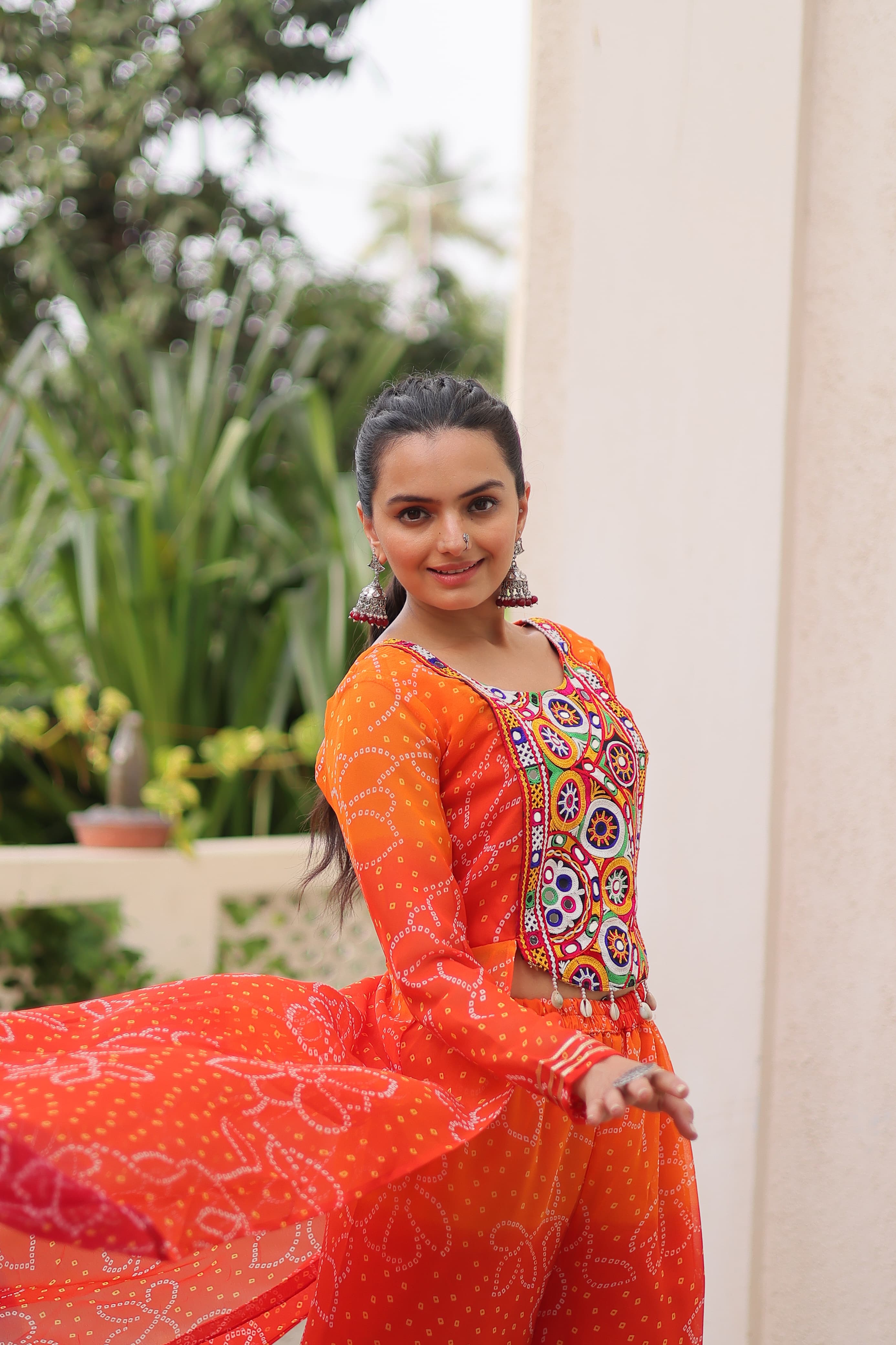 Orange Georgette Bandhani Print Suit with Gamthi Patchwork
