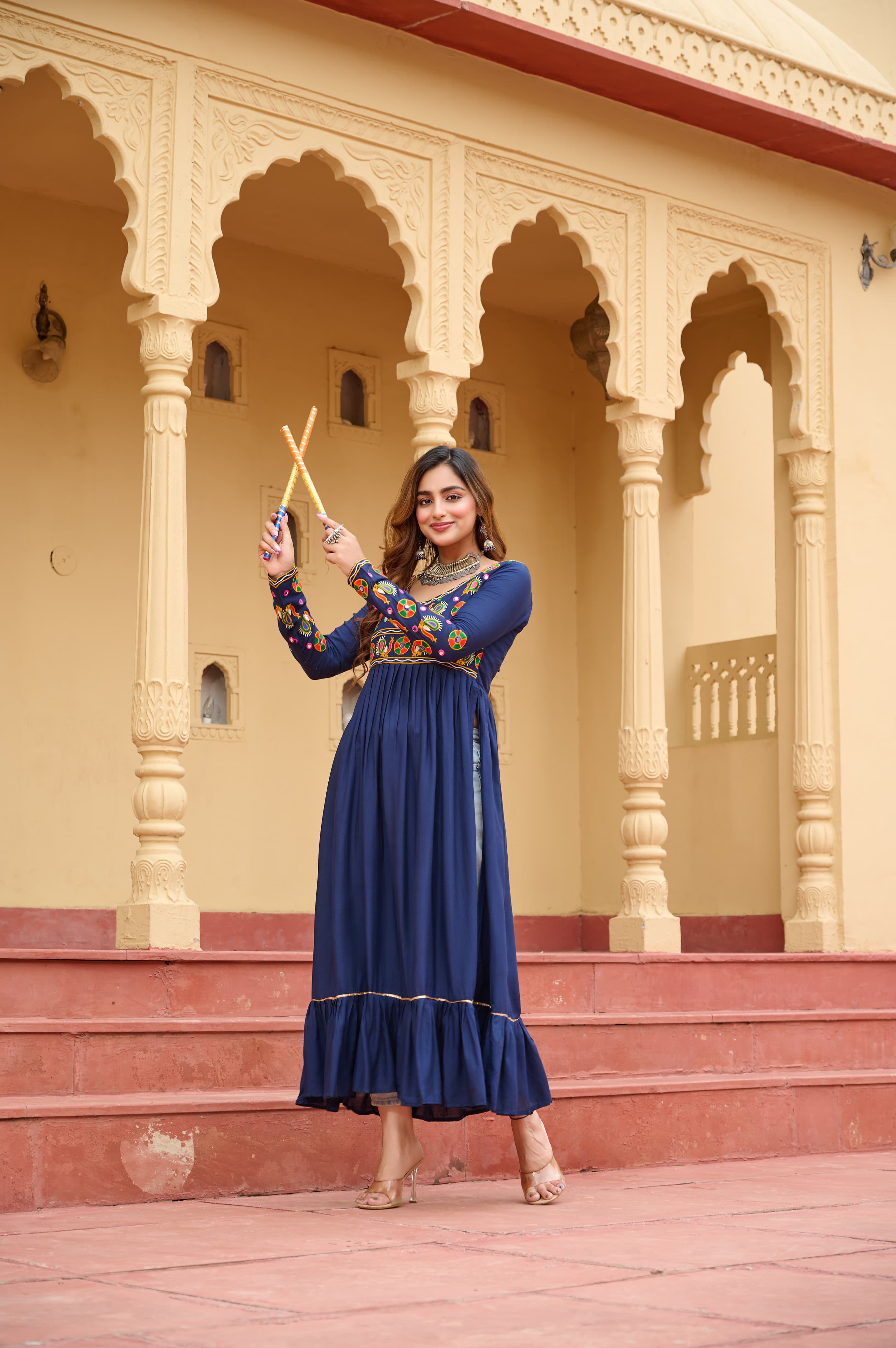 Blue rayon Navratri kurti with detailed multi-colored Kutchi Gamthi embroidery and full sleeves.