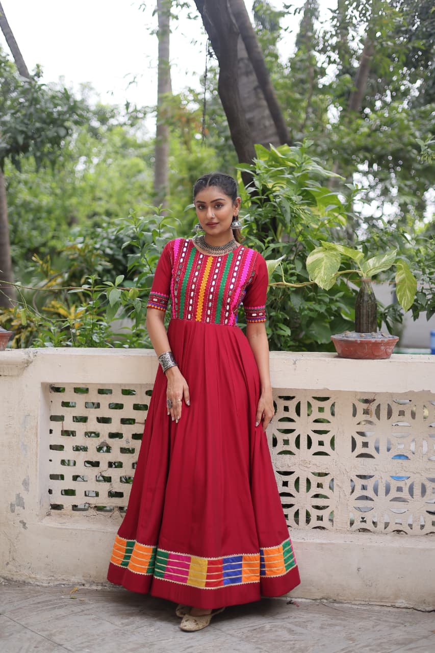 Red Roman Silk Navratri gown featuring multicolor thread and mirror work detailing