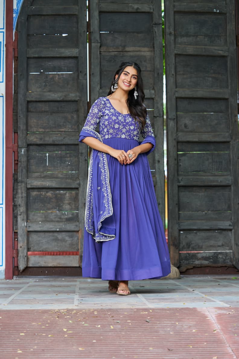 Blue georgette party wear gown with multithreaded beads and sequins