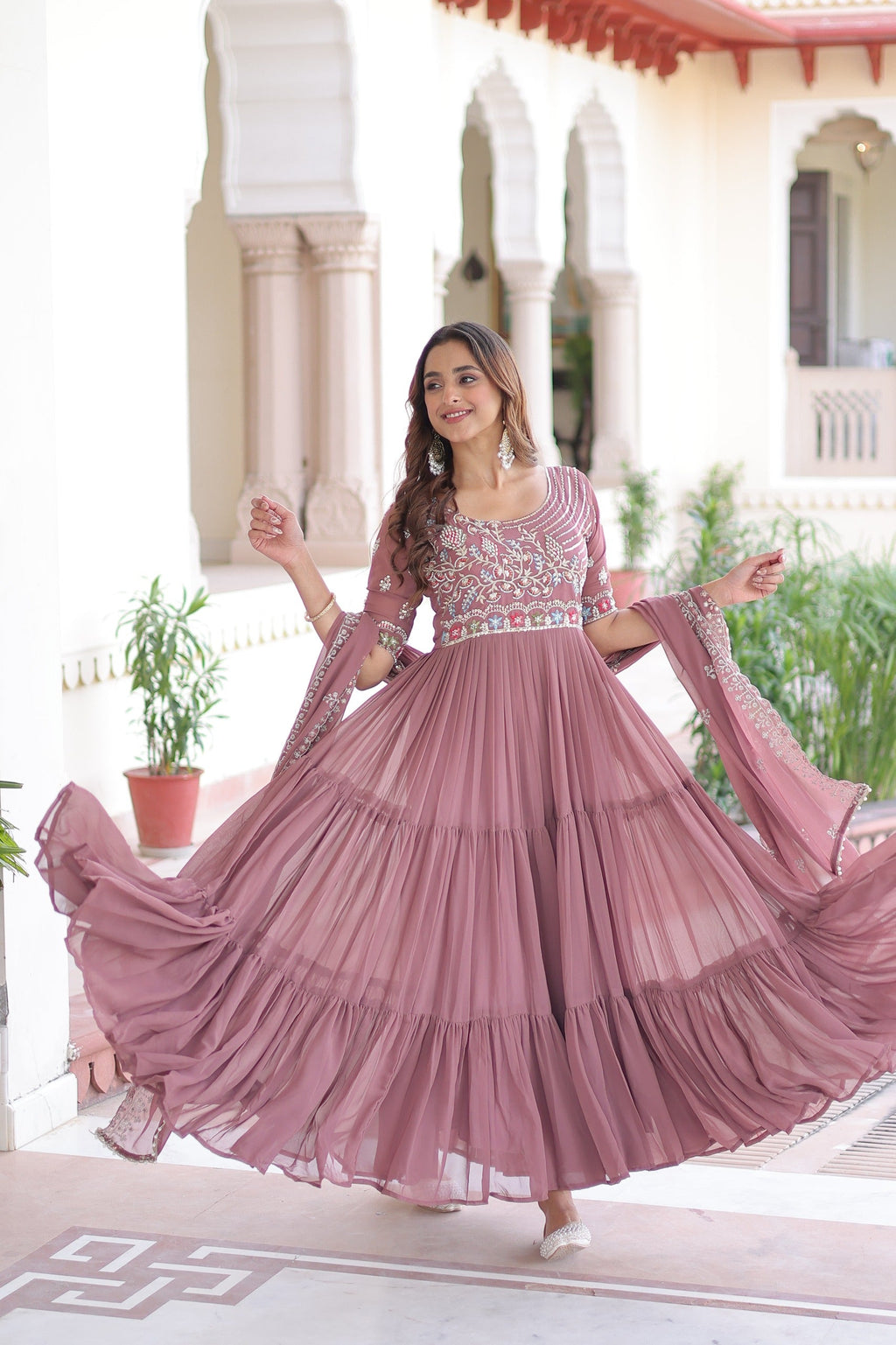 Elegant Onion Pink Georgette gown with heavy sequin and beadwork and matching dupatta