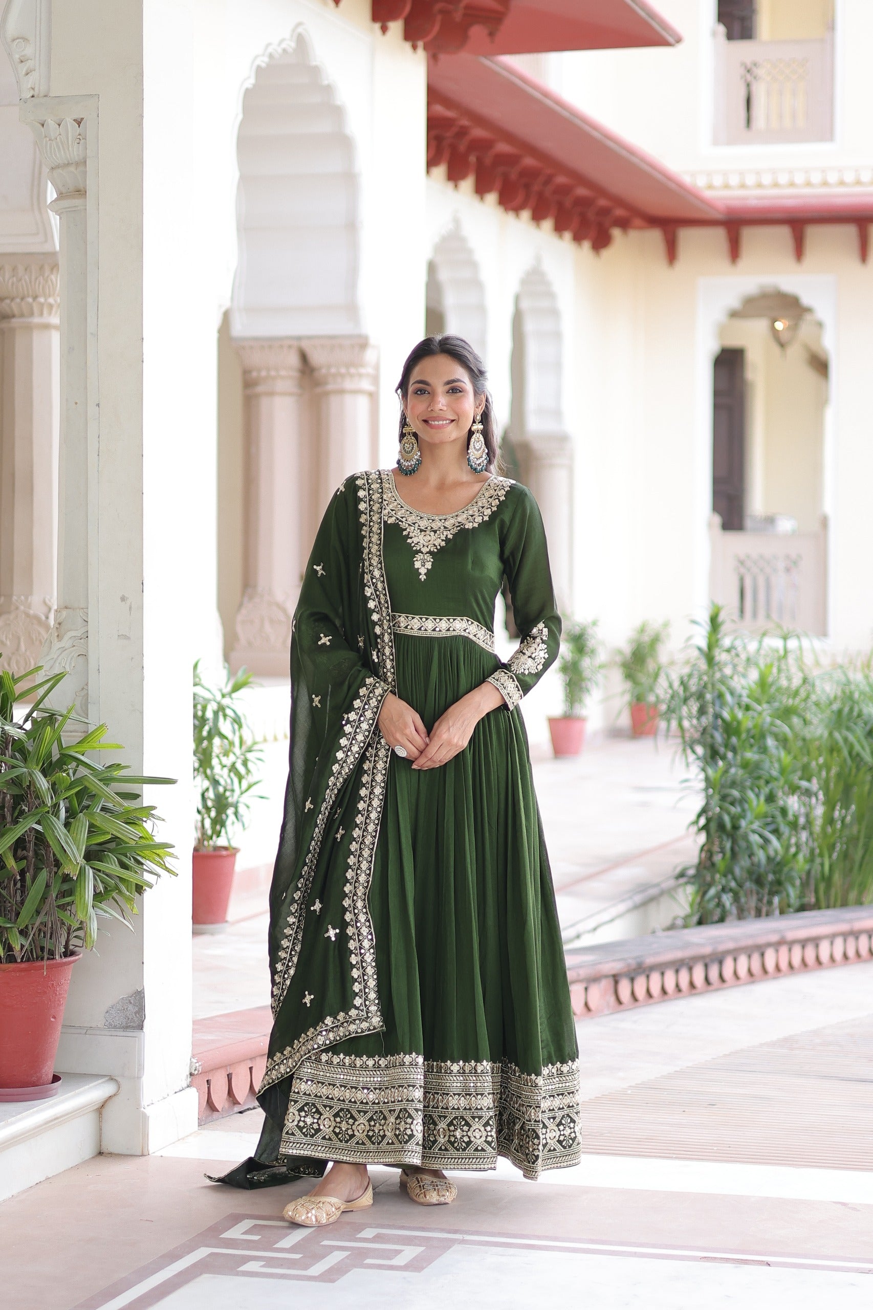 Mahendi colored Vichitra Silk gown with intricate sequins embroidery and matching dupatta