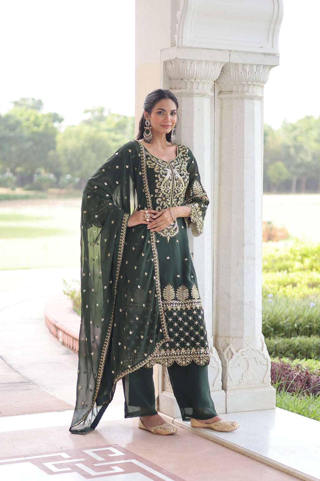 Dista dark green georgette designer salwar suit with intricate embroidery and pan neckline