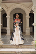 Black georgette Bandhani print lehenga with vibrant Kutchi patchwork detail and 12-meter flair