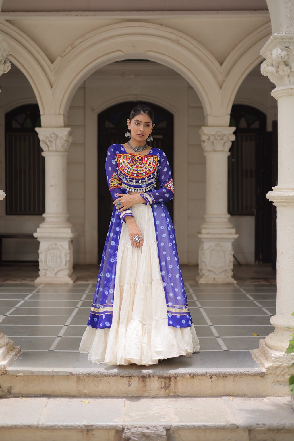 Blue Georgette Bandhani print lehenga with detailed Kutchi patchwork design