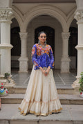 Blue Georgette Bandhani print Navratri lehenga with Kutchi Gamthi work and Gota-Patti lace.