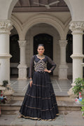 Black georgette lehenga with leheriya print, mirror work, and gota-patti lace for Navratri