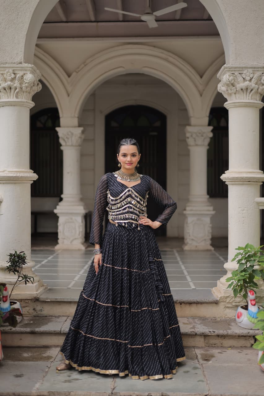 Black georgette lehenga with leheriya print, mirror work, and gota-patti lace for Navratri