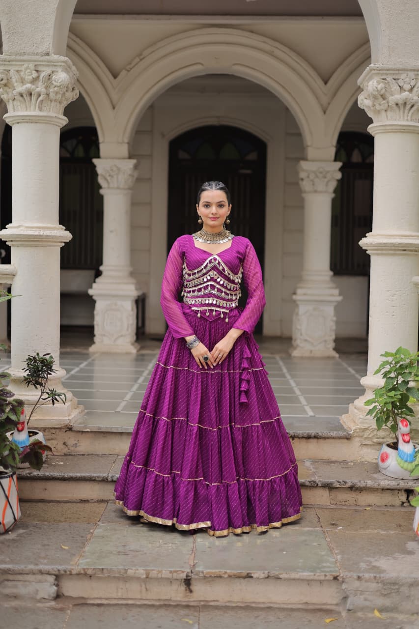 Full-stitched purple georgette lehenga with Leheriya print and mirror lace work for Navratri