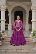 Full-stitched purple georgette lehenga with Leheriya print and mirror lace work for Navratri