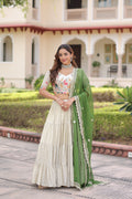 Off White Cosmos Silk lehenga choli with detailed frill stitching and embroidery