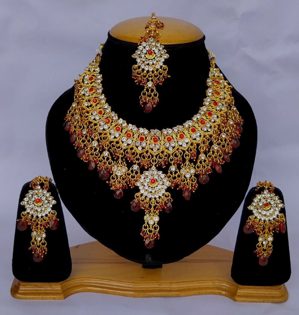 Bridal gold-plated Kundan necklace set with intricate stone design