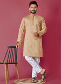 Baby boy wearing a beige Roman silk kurta set with detailed handwork
