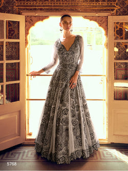 Woman wearing a grey georgette wedding gown with 54-inch length
