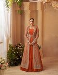 Front view of an orange A-line Chinon silk long top with a matching silk shrug