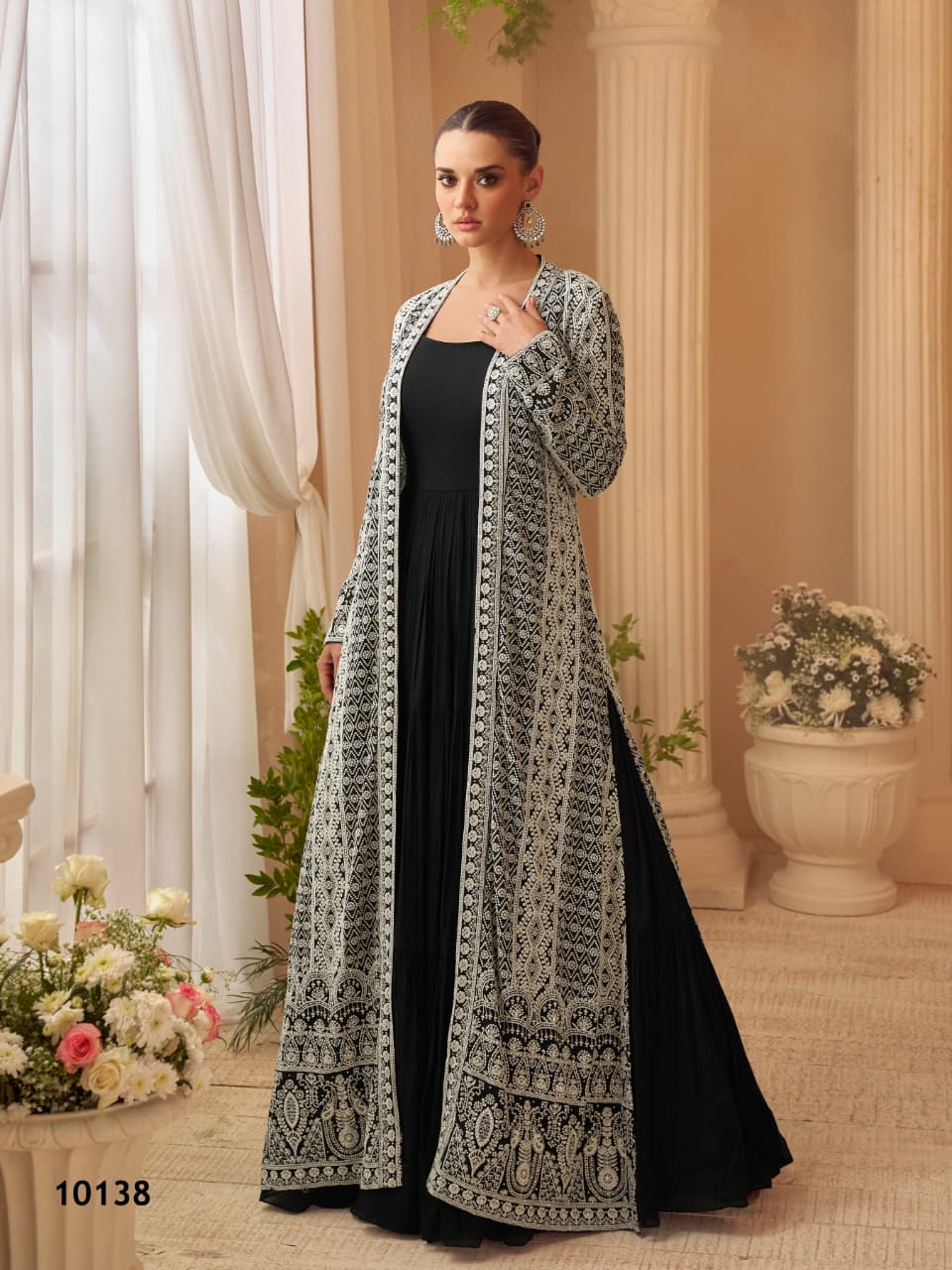 Aarshi Fashions elegant black A-line long top with a matching silk shrug, front view.
