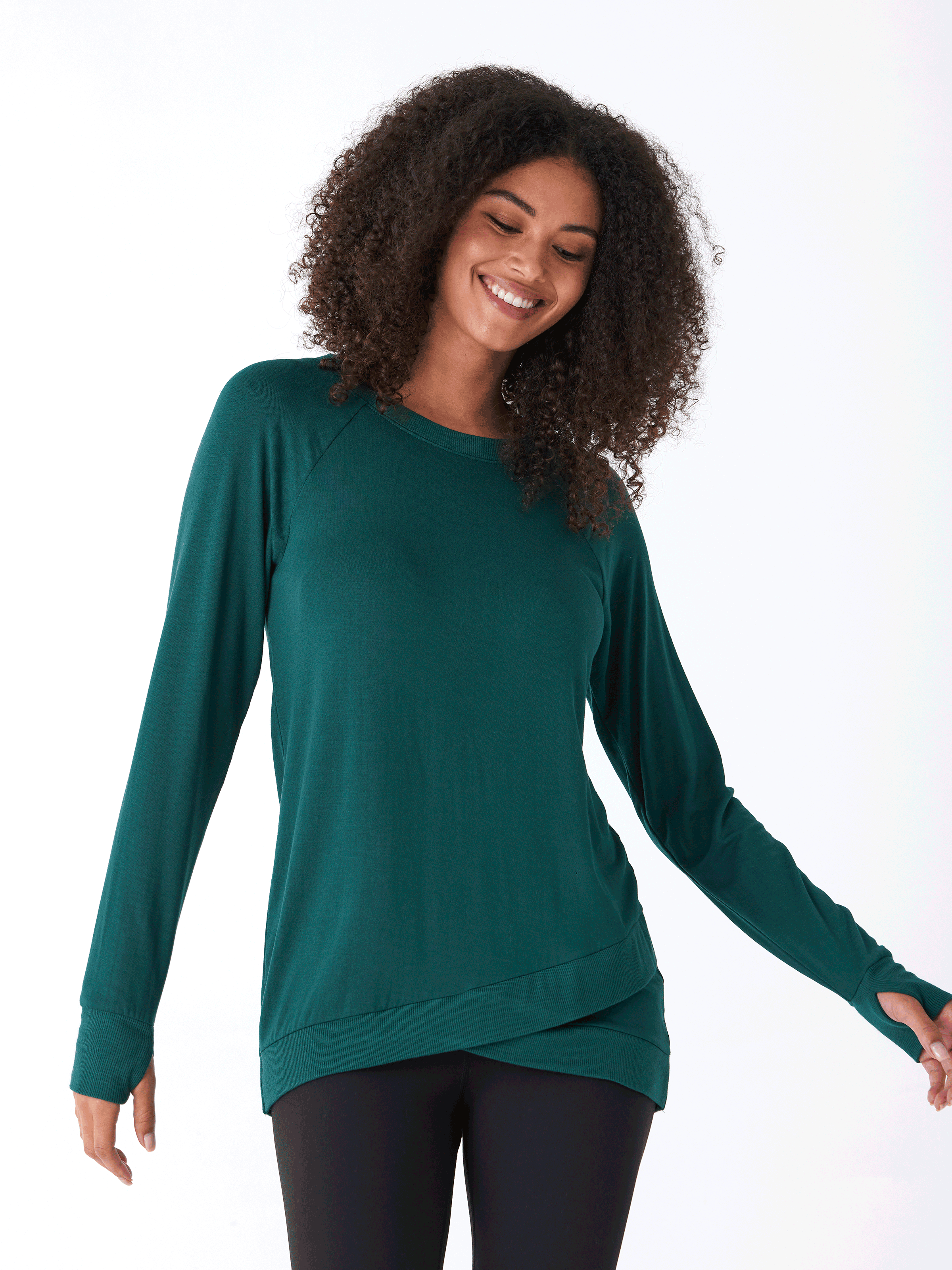 Leanna Feather Fleece Tunic featuring a soft brushed texture and elegant tulip-hem detail.