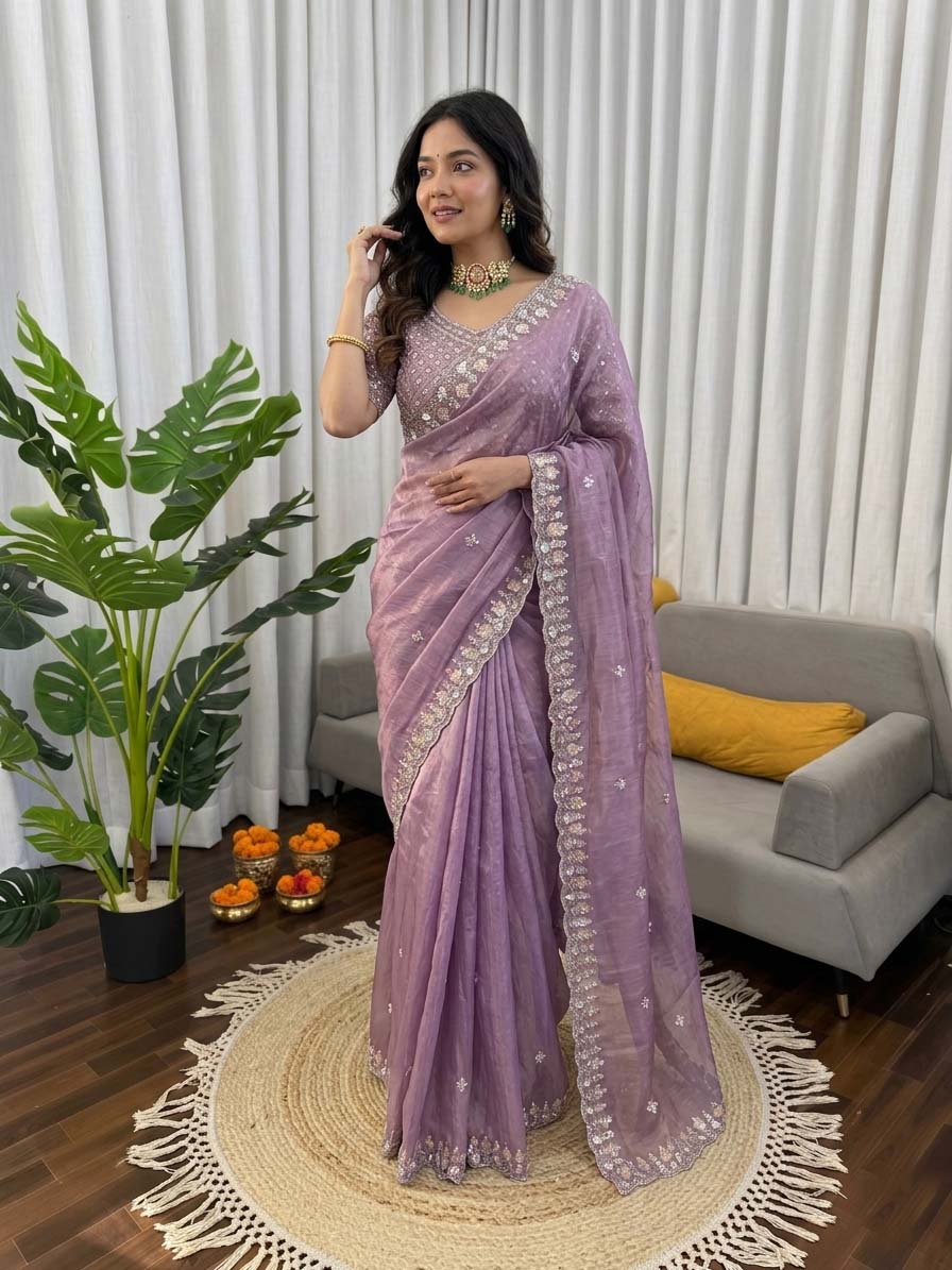 Lavender organza silk party wear saree with intricate sequin embroidery