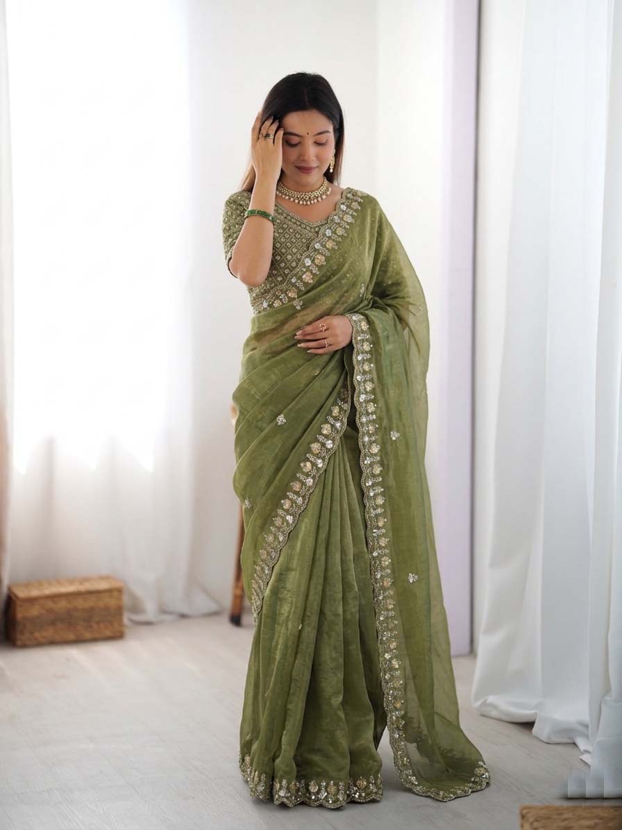 Mehendi green organza silk ready-to-wear saree with all-over sequence embroidery.