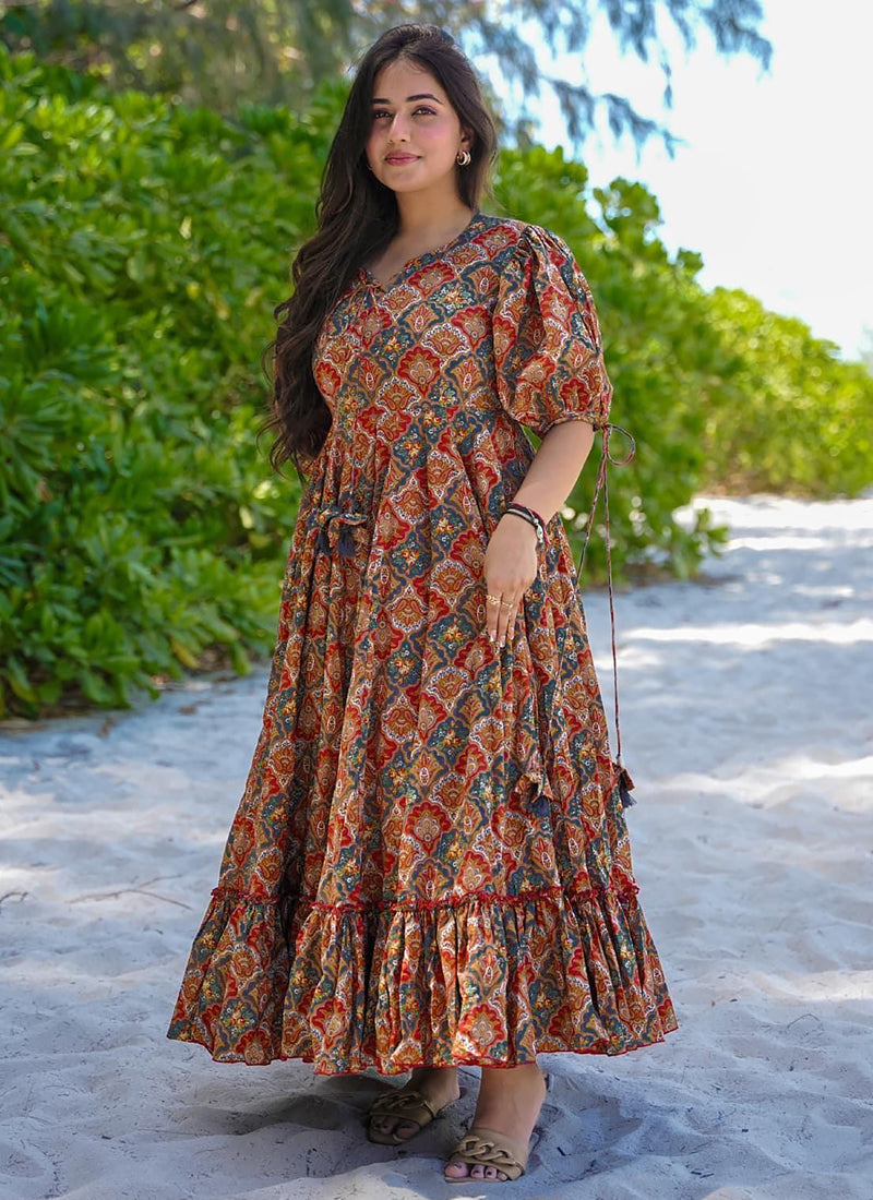 Woman wearing a vibrant multi-color rayon digital print western gown for festive occasions