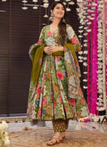 Model wearing a Mehndi green digital print Rayon salwar suit for festive events
