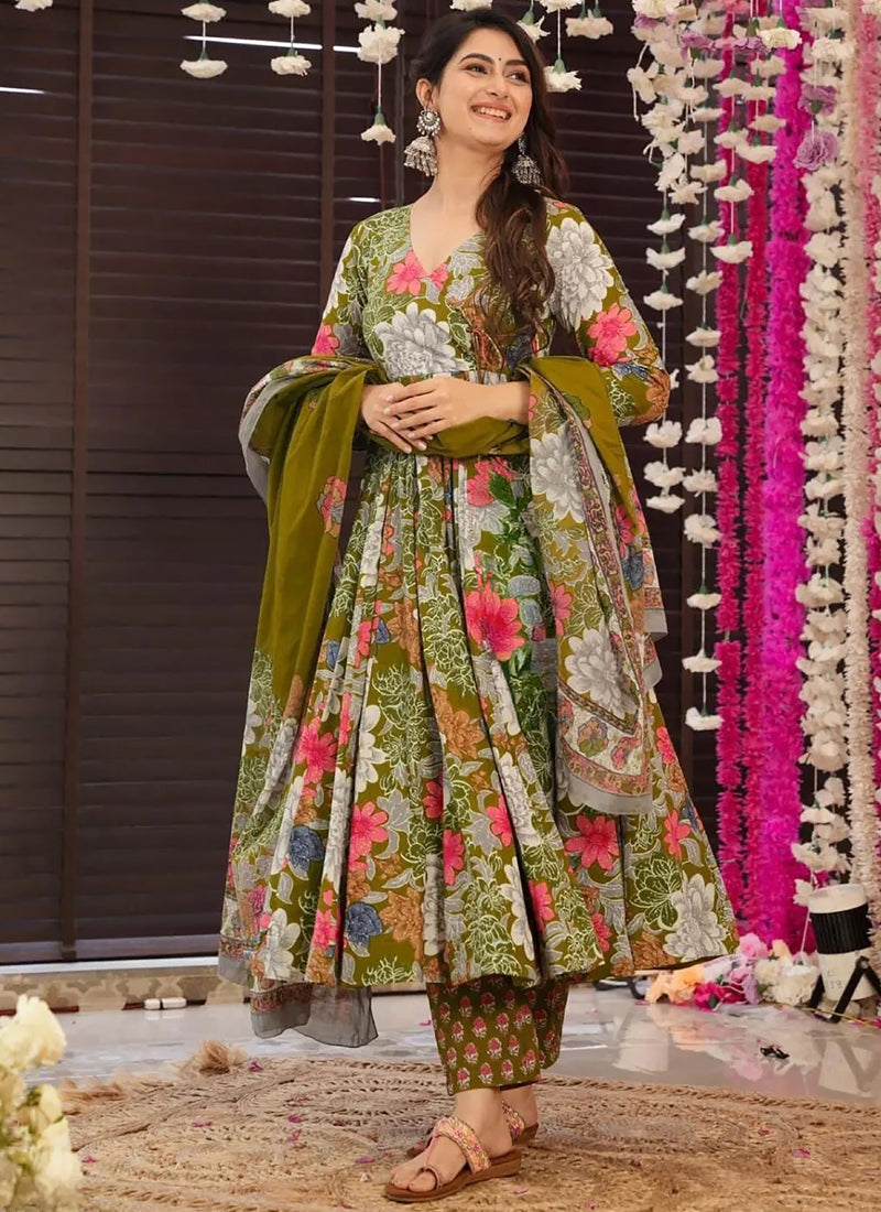 Model wearing a Mehndi green digital print Rayon salwar suit for festive events