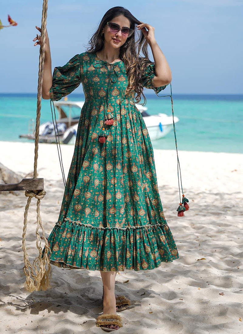 A stunning green rayon designer gown featuring vibrant digital prints, ideal for festive events and weddings.