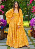 Bright yellow georgette designer gown with digital print for festive occasions